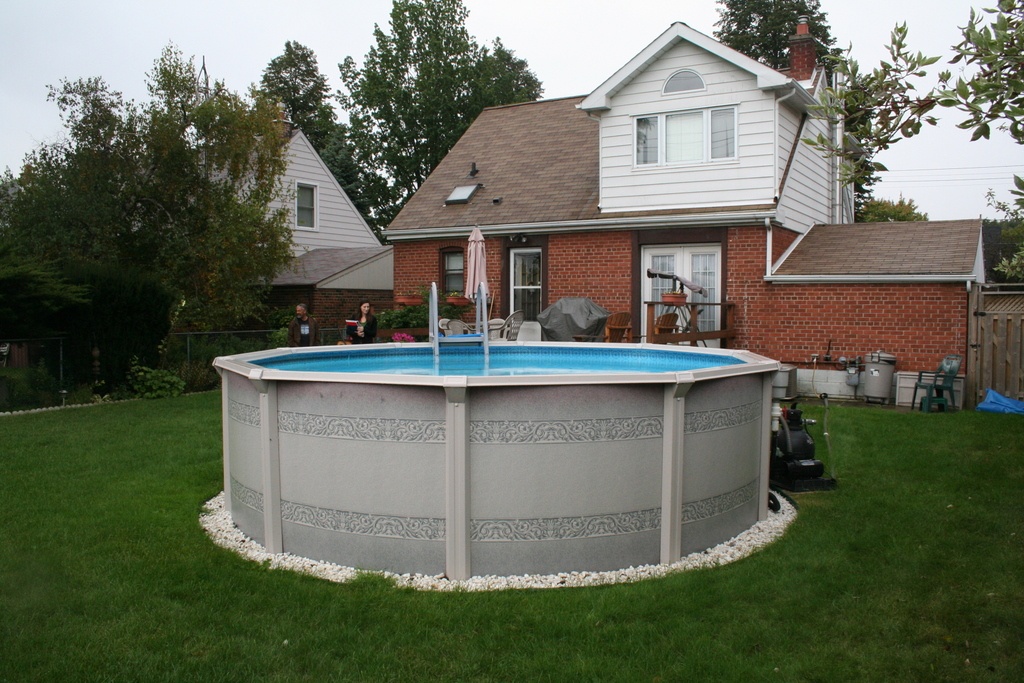 above ground pool on grass